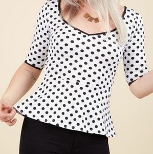 Polka dot peplum blouse